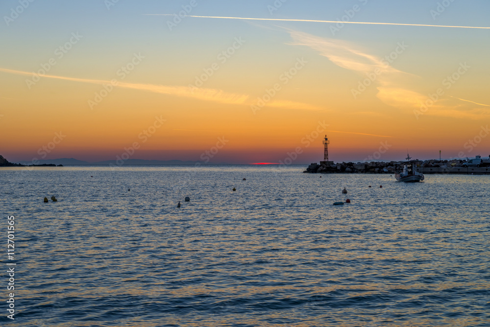 Spectacular sunset at Kini beach, Syros, Greece. Spectacular sunset at Kini beach, Syros, Greece.