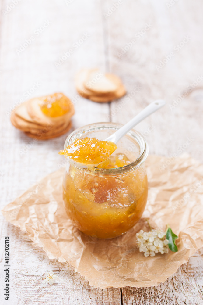Fresh fruity juicy jam with figs in a jar with crackers and cottage cheese for breakfast, closeup with copy space. Fresh fruity juicy jam with figs in a jar with crackers and cottage cheese for breakfast, closeup with copy space.
