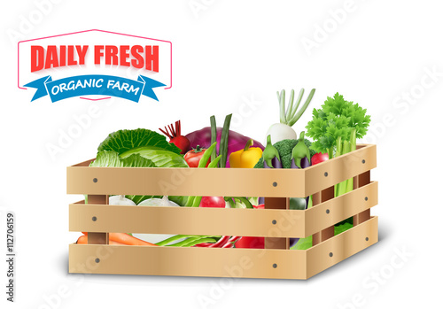 Fresh vegetable in wooden crates with blue ribbon on a white background