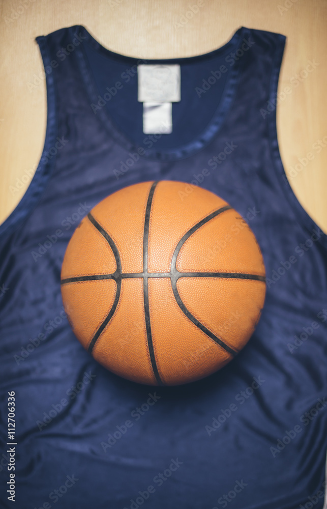 Fototapeta premium Basketball on a blue jersey