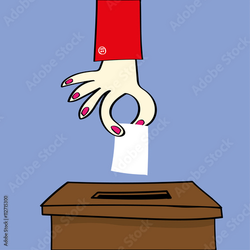 Hand of a woman or girl about to place their vote by dropping a ballot paper into the voting box