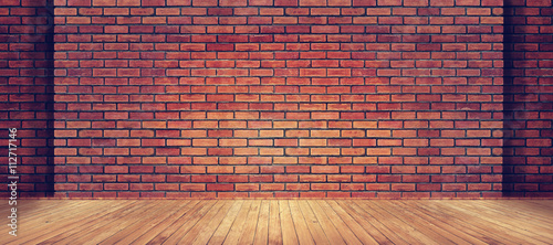 Red brick wall texture and wood floor background