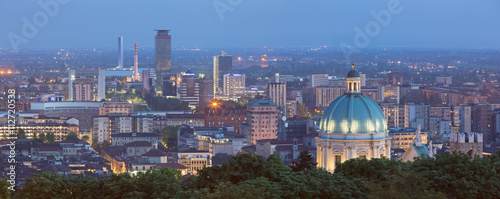 BRESCIA, ITALY - MAY 21, 2016: The panorama of Brescia with the cupola of Duomo at dusk.
