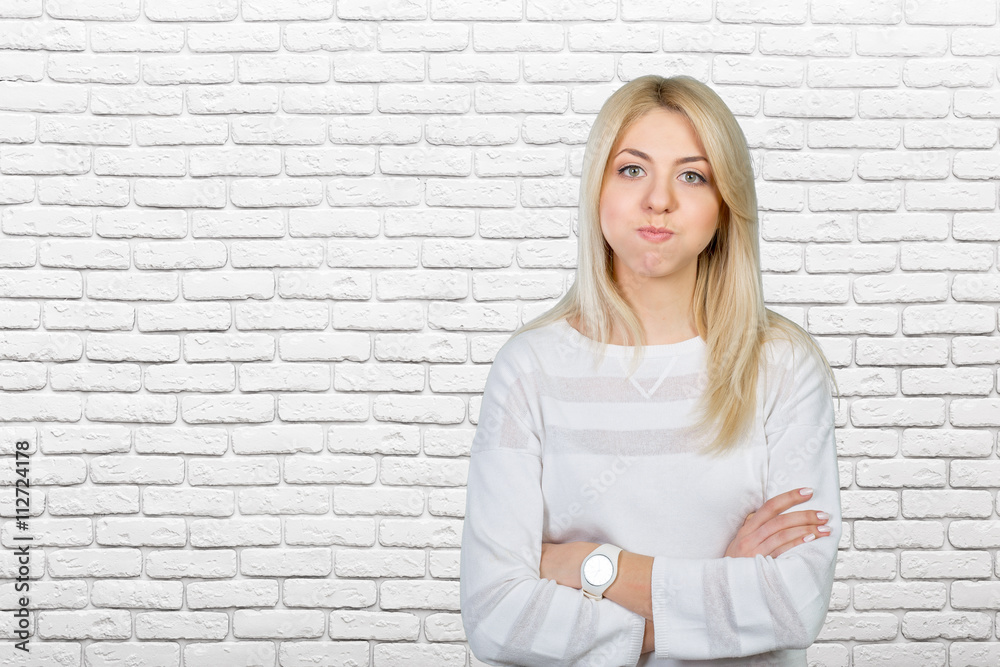 blonde woman acting surprised and confused