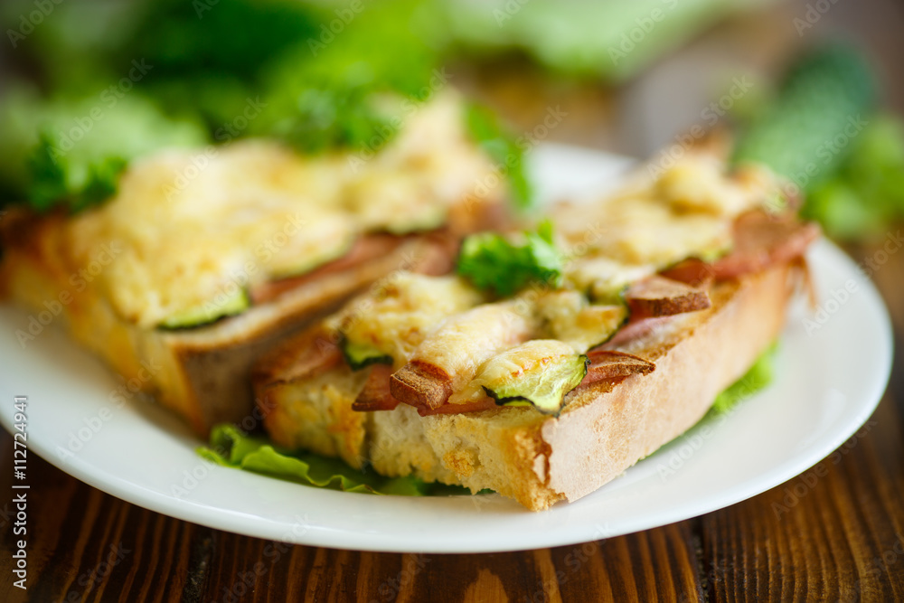 toast baked with sausage, cheese and cucumber toast baked with sausage, cheese and cucumber