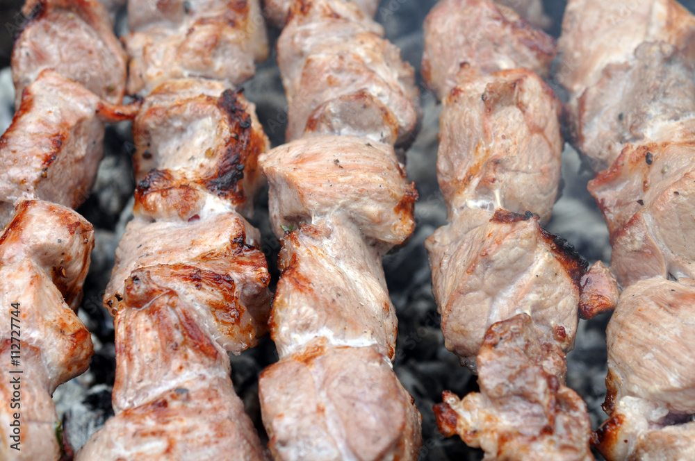 Barbecue Beef Kebabs On The Hot Grill Close-up