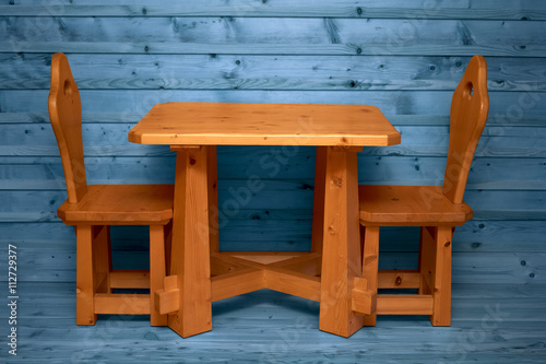 Simple wooden chair in wooden room