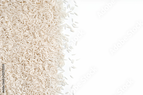 White rice  on white background .  Close up, top view, high resolution product. photo