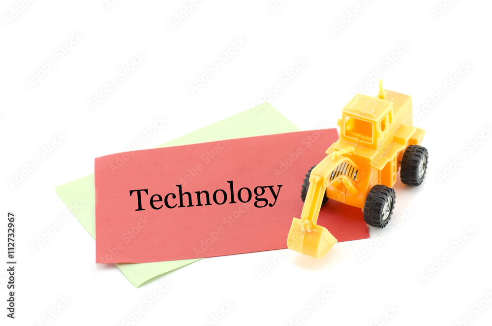 Obraz premium image concept yellow toy bulldozer on red paper and blur word wo