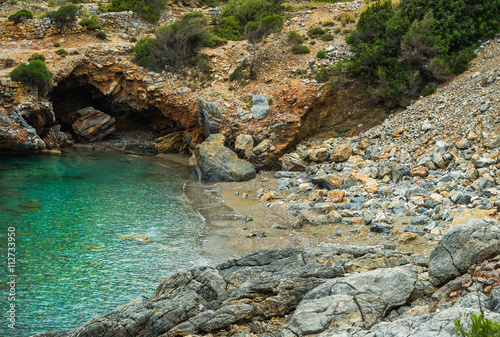 Turquoise sea bay with cave in Turkey, Mediterranean region