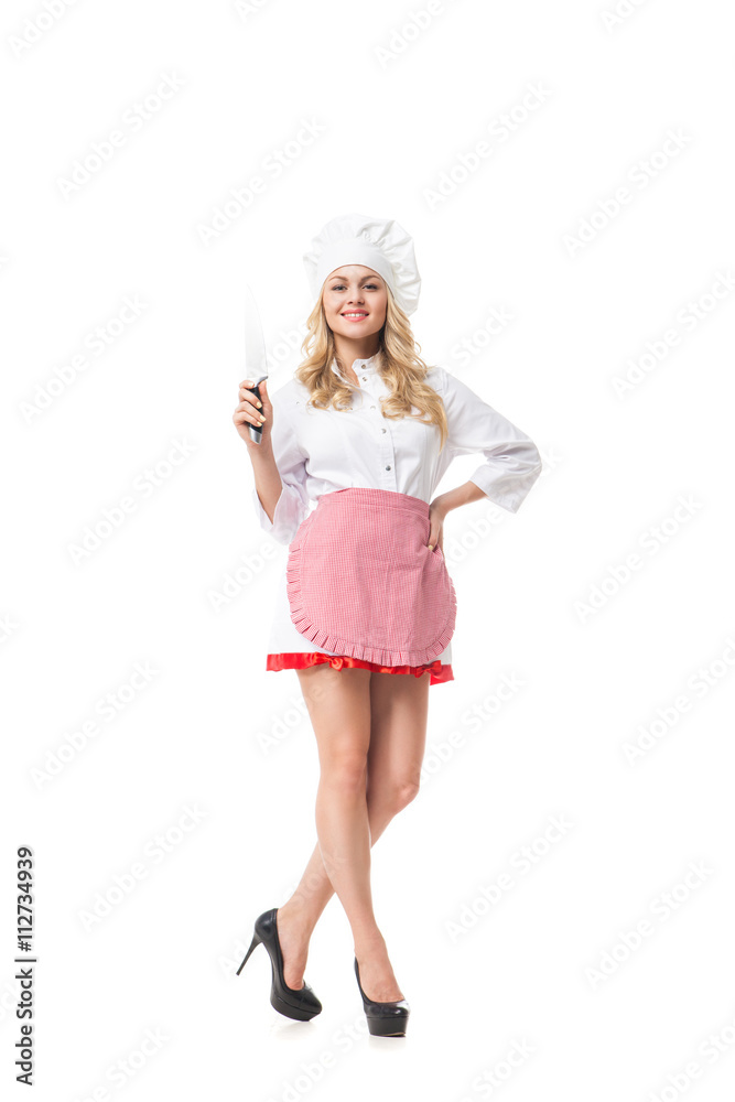 Beautiful blonde woman in chef uniform with knife Beautiful blonde woman in chef uniform with knife