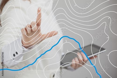 Geographic information systems concept, woman scientist working with futuristic GIS interface on a transparent screen.