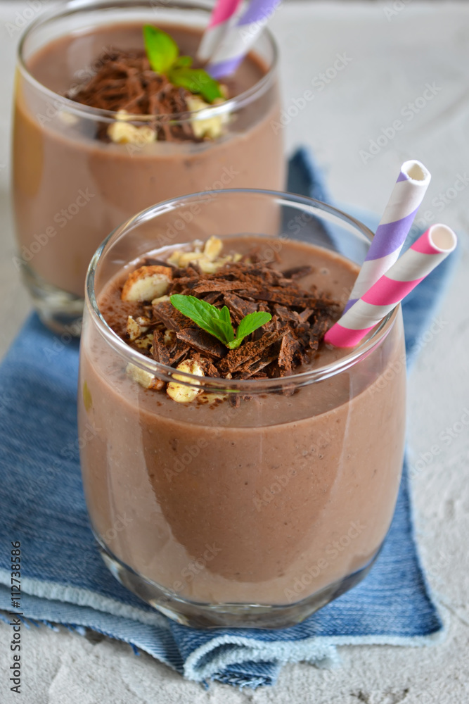 chocolate smoothie with banana, blueberries and almonds on a con chocolate smoothie with banana, blueberries and almonds on a con
