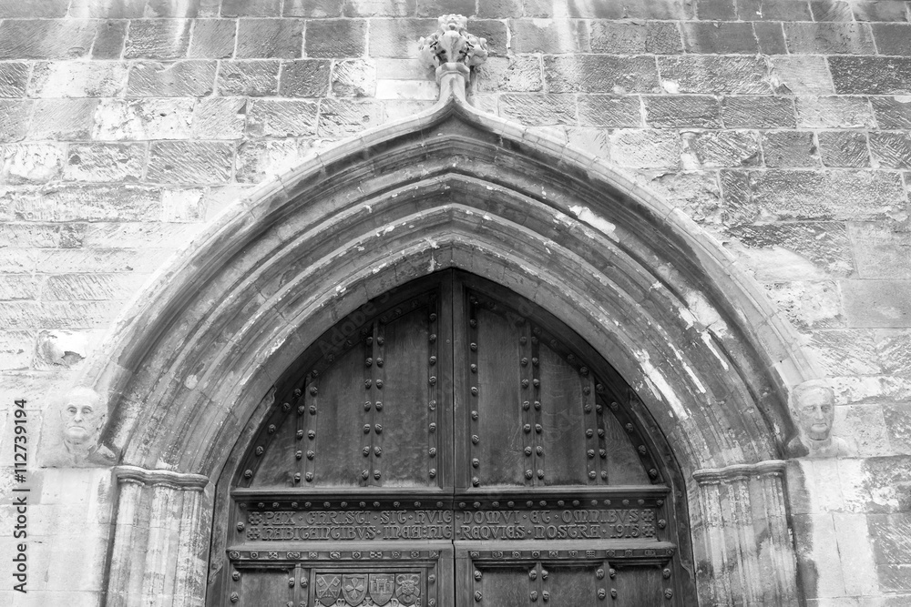 Arch above old door west facade of Tewkesbury Abbey