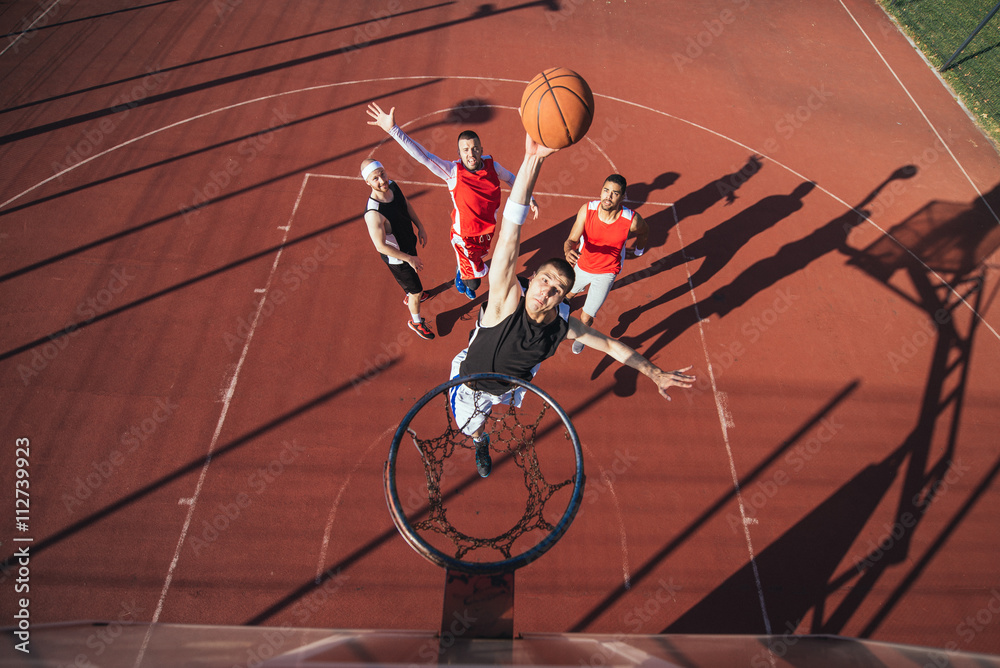 Fototapeta premium Showing his basketball skills