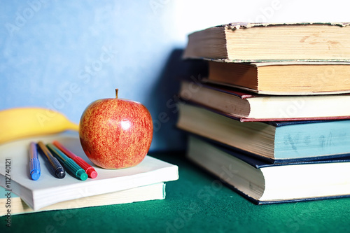 grunge effect photo education book stack apple pen