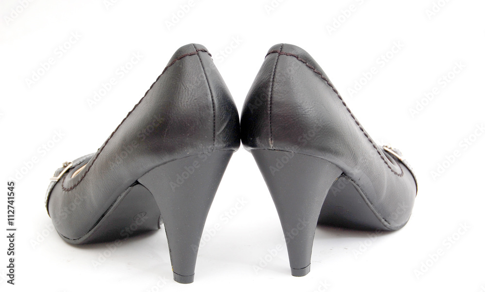sexy black female shoes on a white background. sexy black female shoes on a white background.