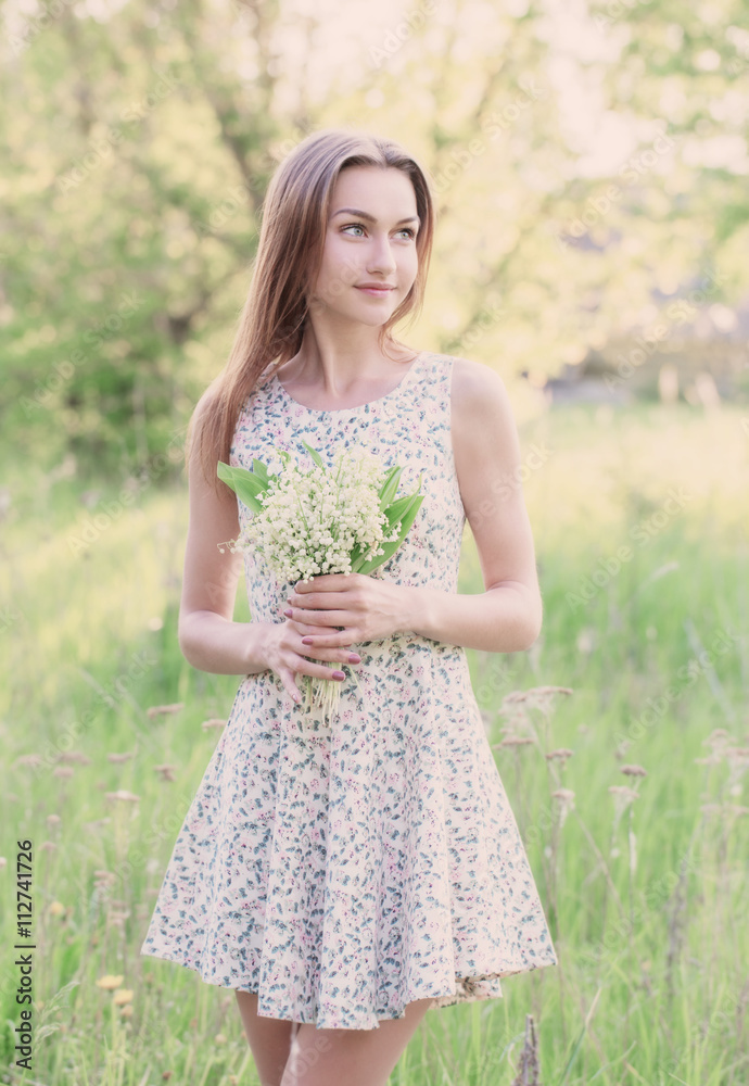 beautiful girl with lily of the valley beautiful girl with lily of the valley