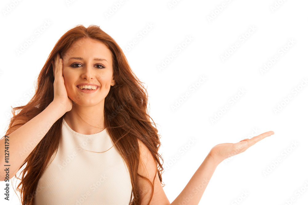 Business woman holds hand and points to copyspace as she would h Business woman holds hand and points to copyspace as she would h