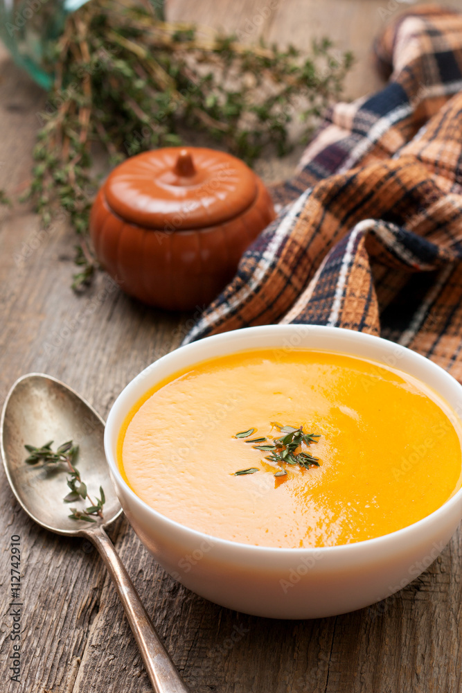 pumpkin soup - puree in a white bowl pumpkin soup - puree in a white bowl