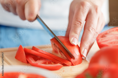 Diced tomatoes on a cutting board
