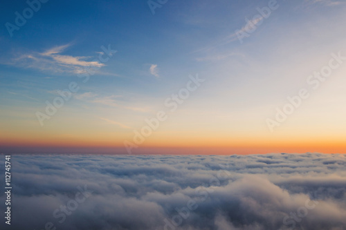 Canvas Print Beautiful sunset on the hill above clouds