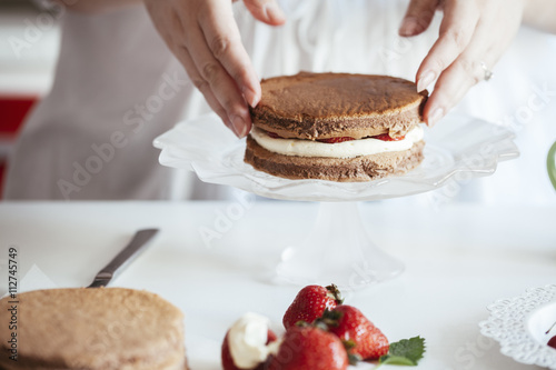 Woman Making The Naked Cake