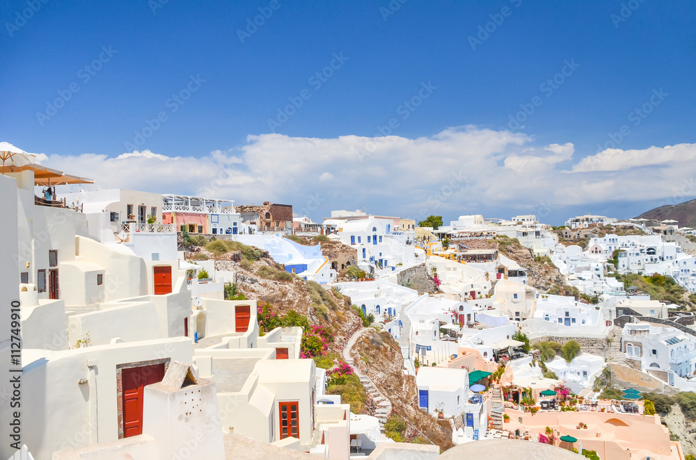 a picturesque town on the hillside of Santorini