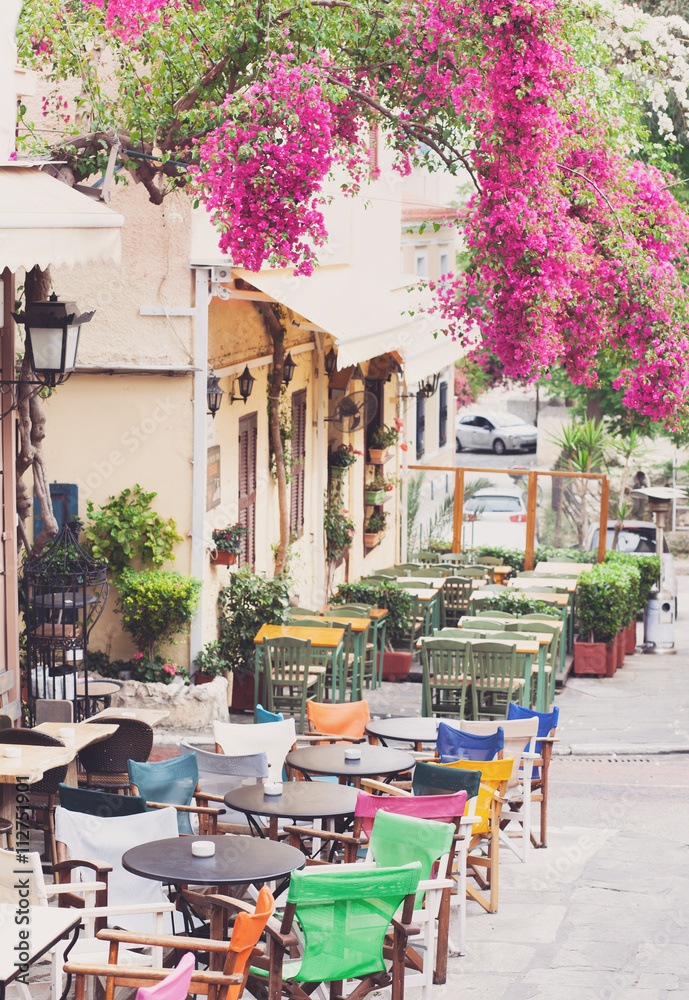 Charming street in the old district of Plaka in Athens, Greece