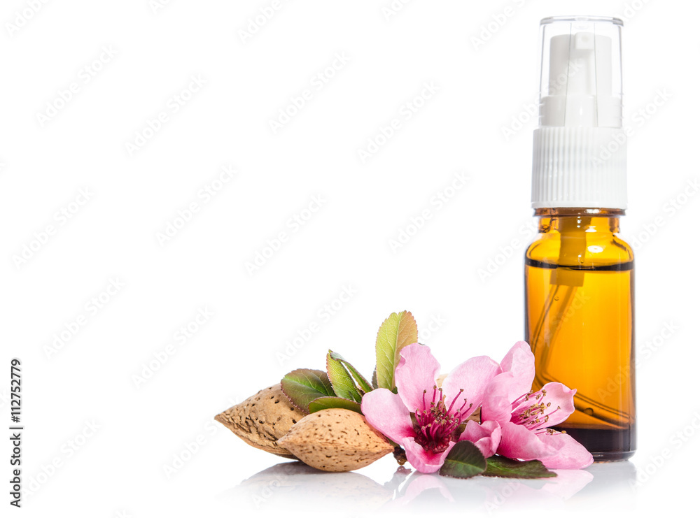 Face cream bottle whith flowers isolated on white