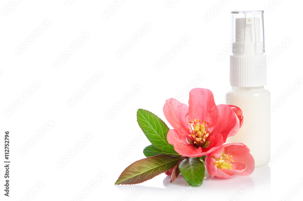 Face cream bottle with pink flower isolated on white