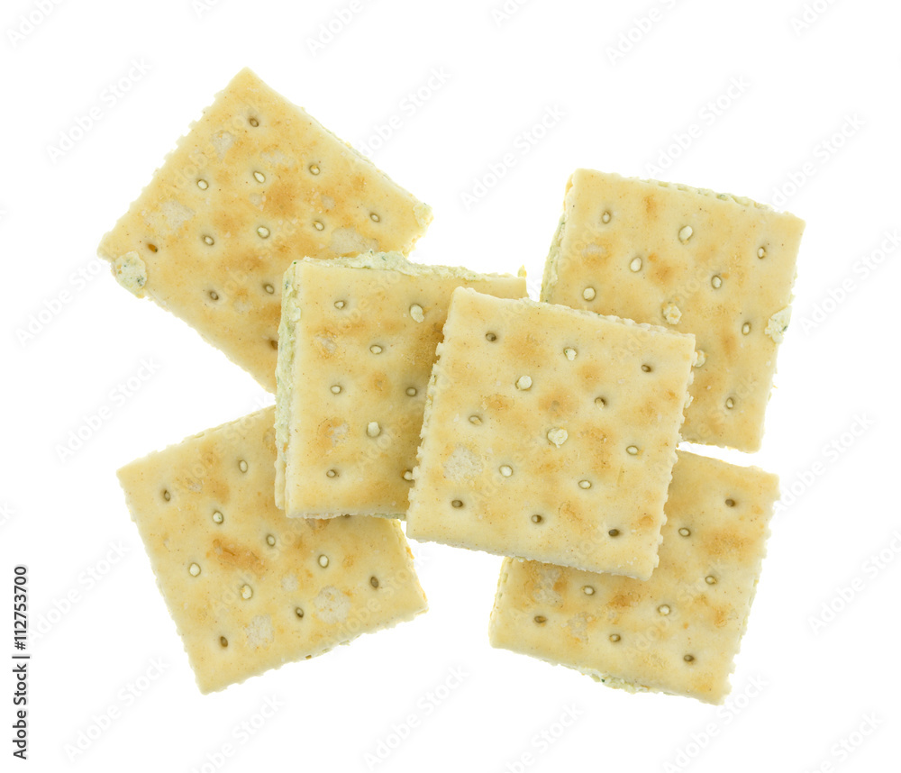 Group of cream cheese and chives crackers isolated on a white background