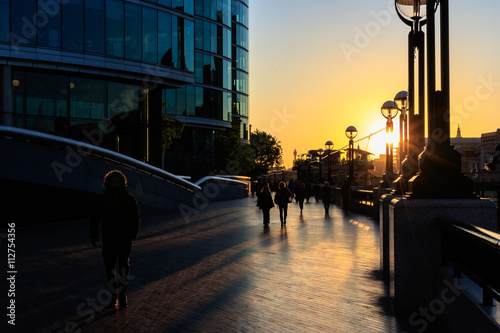 Sunset forms Silhouette of Thames sidewalk photo