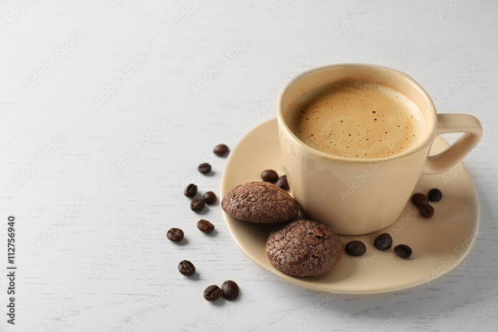 Cup of coffee with cookies on wooden table Cup of coffee with cookies on wooden table