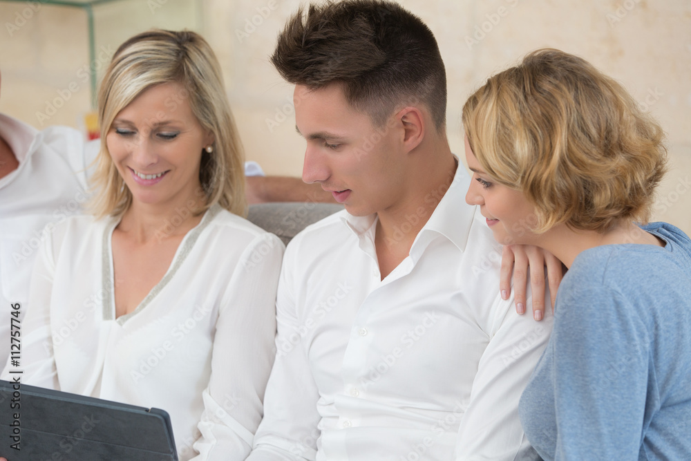 happy family relaxing on sofa