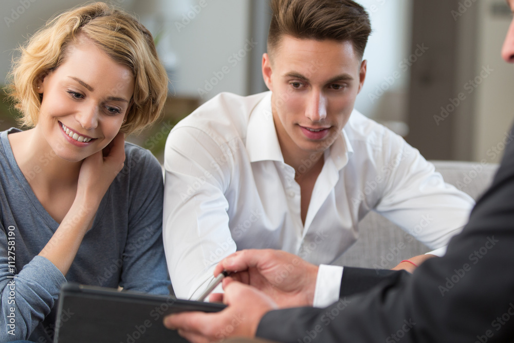 couple meeting financial adviser for investment couple meeting financial adviser for investment