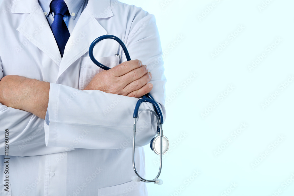 Professional doctor with stethoscope, isolated on white Professional doctor with stethoscope, isolated on white