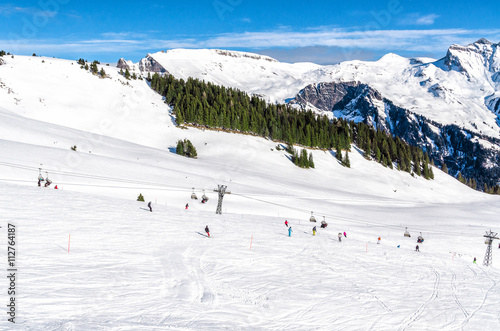 Snow slope in mountain with small slopes for beginners. Ski resort in Alps Switzerland, ''Jungfrau''. 