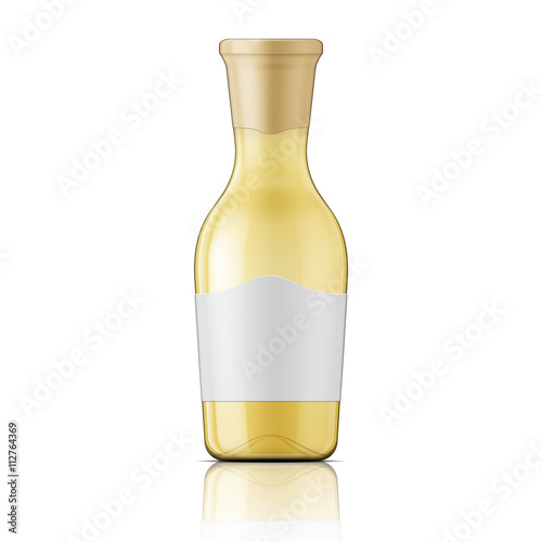 Glass bottle with wide neck and label.