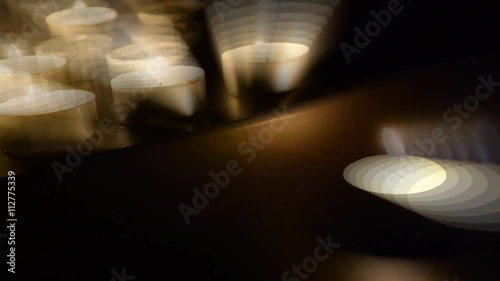 Abstract burning candles in the dark
