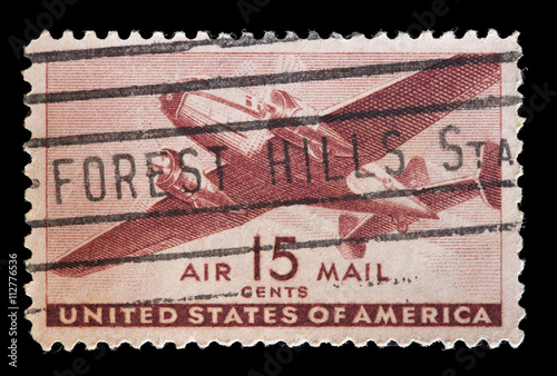 United States used postage stamp showing twin-motored aircraft