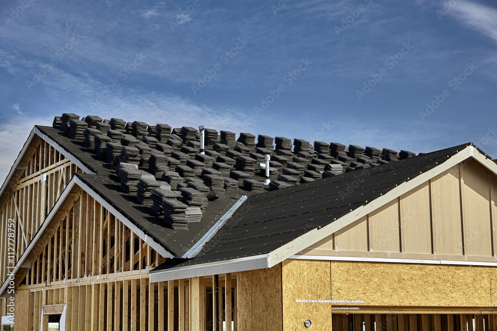 Fototapeta premium Home building industry double gable roof construction