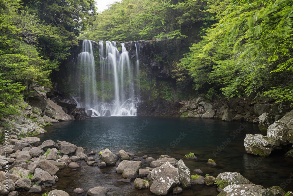 Second tier of the Cheonjeyeon Falls on Jeju Island in South Korea. Second tier of the Cheonjeyeon Falls on Jeju Island in South Korea.