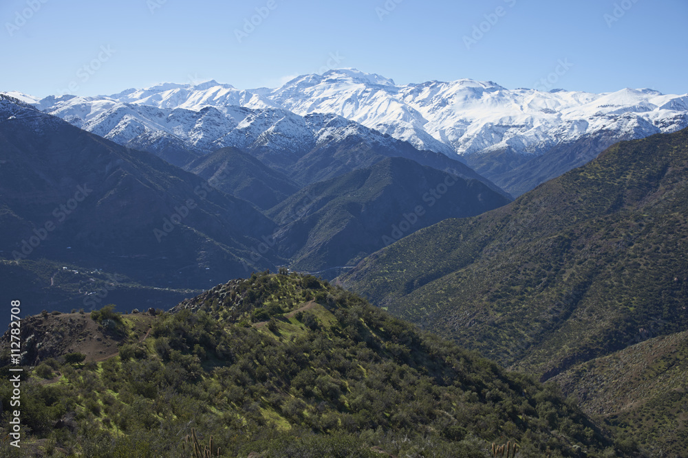Winter snow covering the mountains surrounding Santiago, capital city of Chile. Viewed from Parque Puente Nilhue.