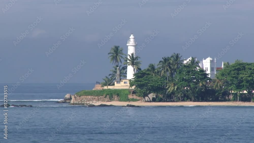 View to the lighthouse at the seaside in Galle, Sri Lanka. View to the lighthouse at the seaside in Galle, Sri Lanka.