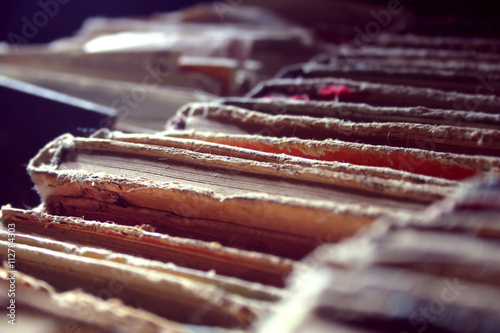 Old Books Covered With Dust. Background. Shallow depth of field and selective focus