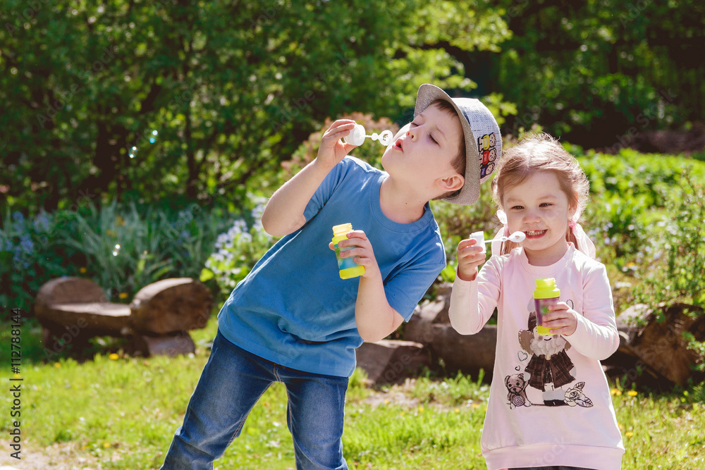 Cute Children are Playing in Park Cute Children are Playing in Park