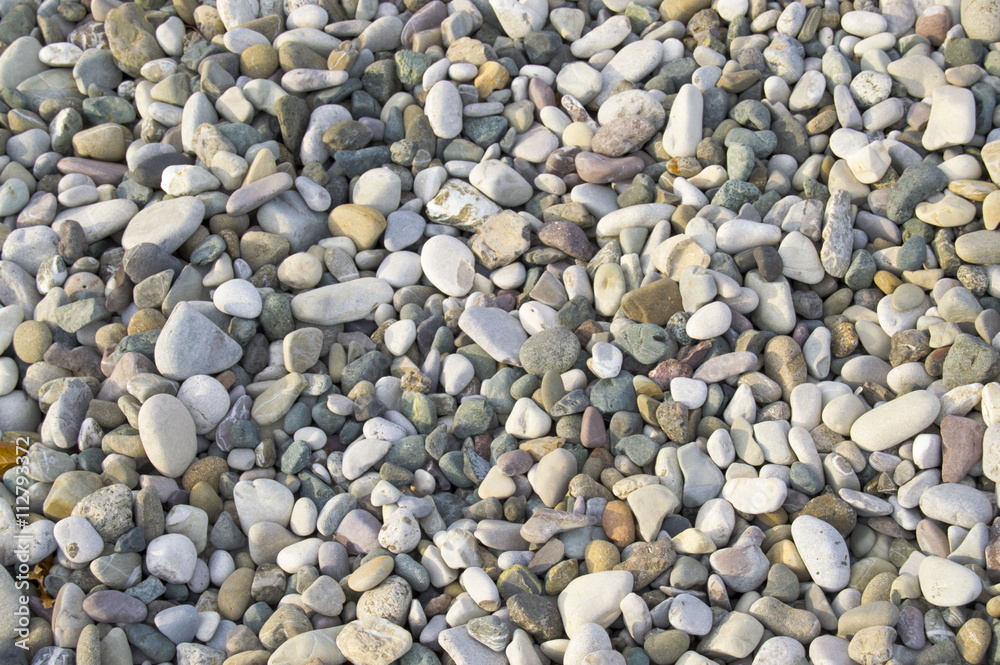 Rocks on a beach warm from the sun's rays Rocks on a beach warm from the sun's rays