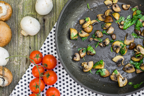 Top View on a Sautéed Brown and White Champignon Mushrooms with