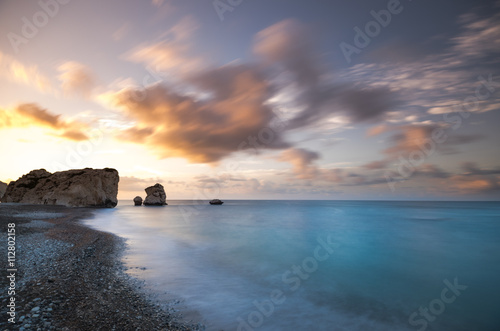 The Rock of the Greek, Cyprus. Place of the birth of the goddess Aphrodite. Petra tou Romiou. Movement of clouds on long exposure